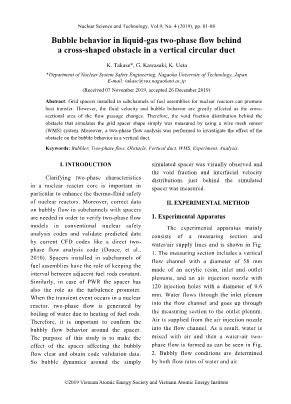 Bubble behavior in liquid-gas two-phase flow behind a cross-shaped obstacle in a vertical circular duct